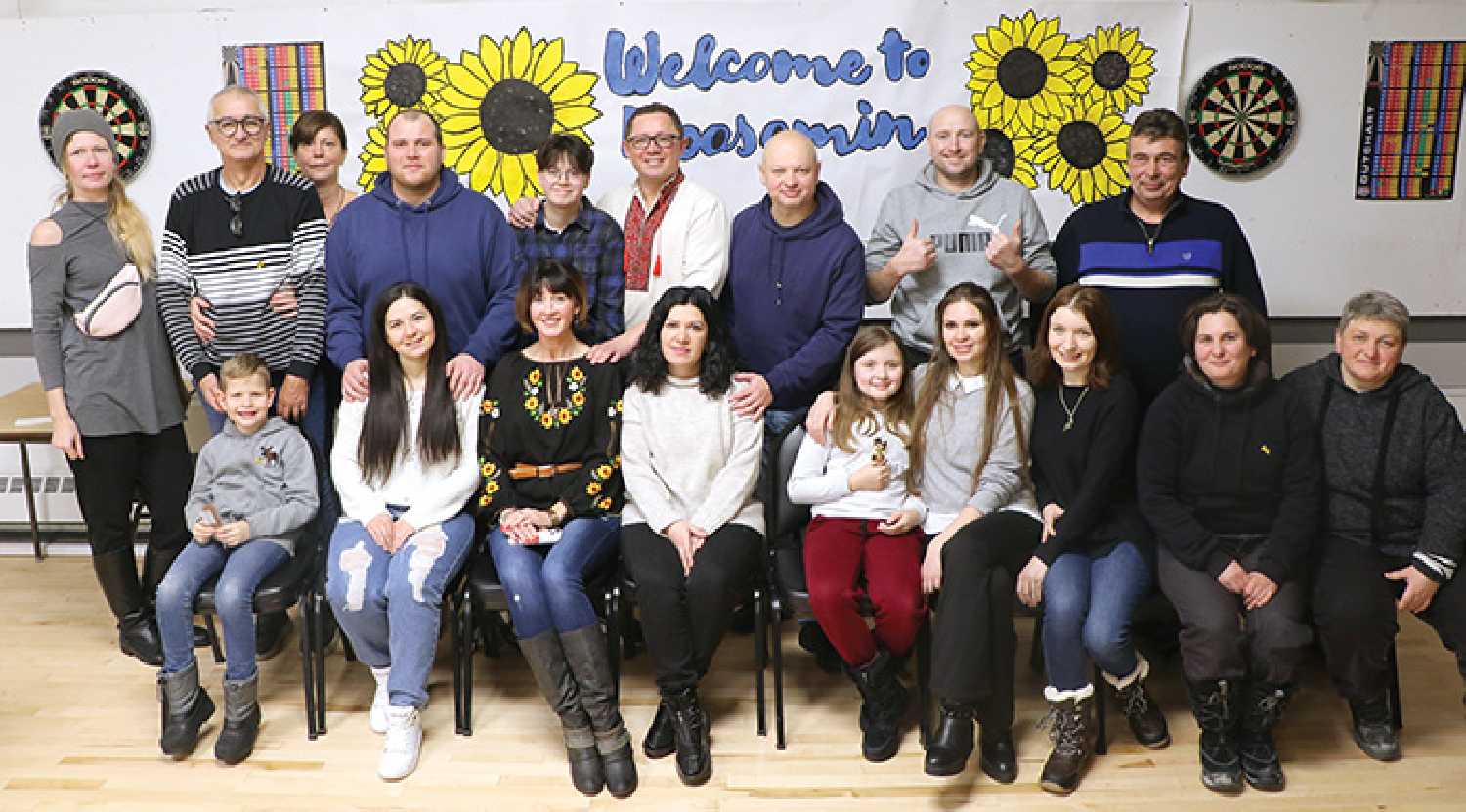 The Ukrainian families from the community who attended an evening event that was dedicated to welcoming and meeting the new people who moved to in Moosomin in the last year. The event was hosted by the Spiritual Care Family and Friends Group on Dec. 8  at the legion.  In order of family grouping are Ludmilla, Yuri, Tatiana, and their son Nikita Ponamarenko (in front), Ivan and Diana Kuchynska, Anna, Roman, and Marina Chernykh, Valentyn and Irena Karpenko, Roman and Julia Marynets, Olha and her daughter Zlata Volokh (on the other side of Julia), Roman Swed (in back), and Irena Gorbynovt and Oxa